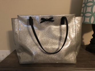 Kate Spade and Dooney and Bourke purses