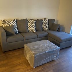 Grey Sectional With Designed Pillows And Ottoman ‼️new In Stock ‼️