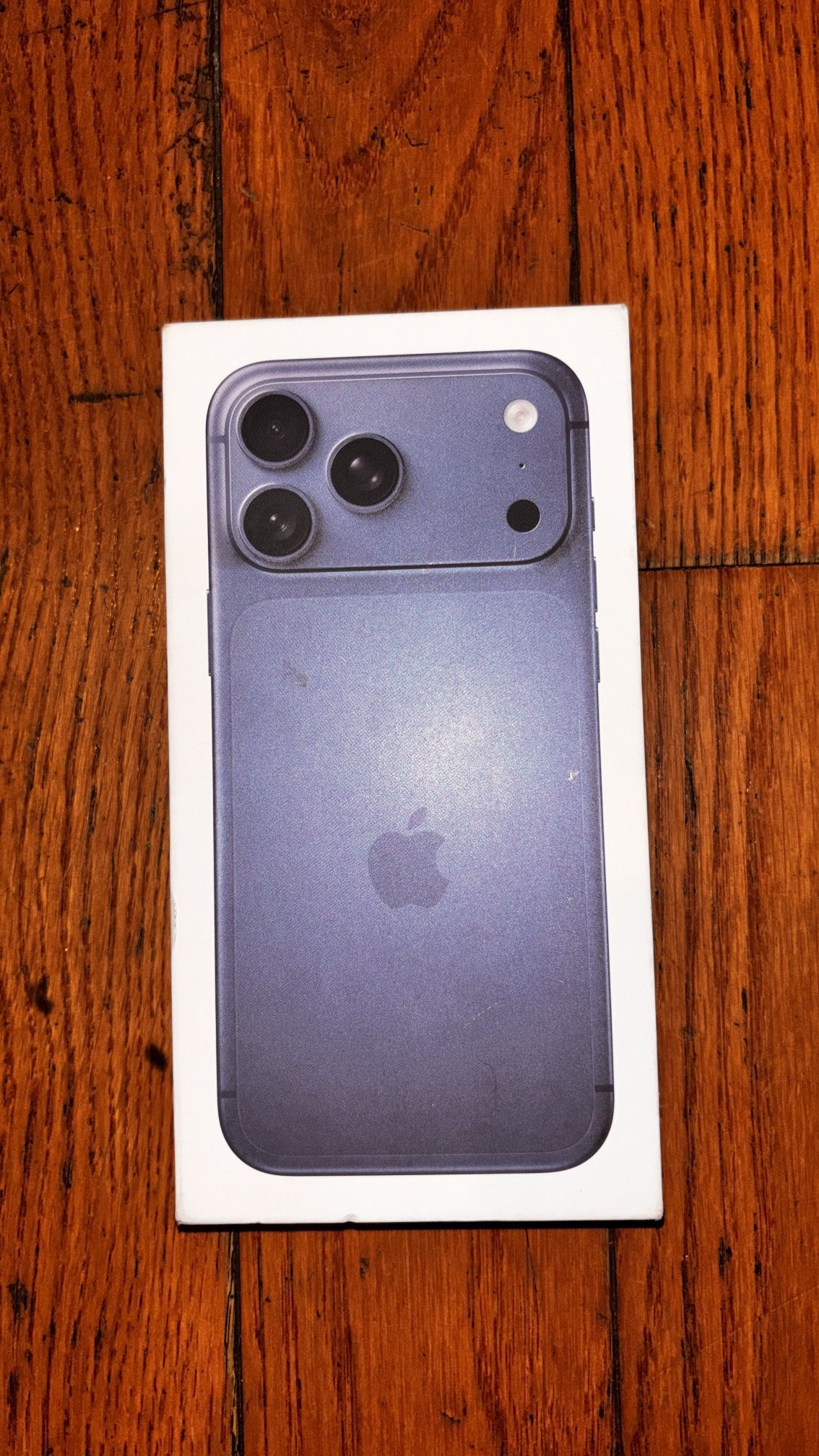 iPhone 17 pro max and headphones.