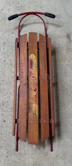 Vintage Wooden Snow Sled with Red Metal Frame