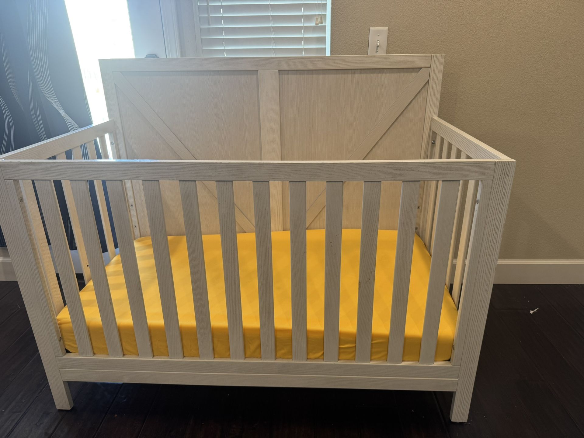 Suite babe 4-in-1 convertible crib with Graco foam mattress.