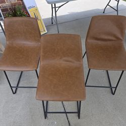 Set of three counter height bar stools