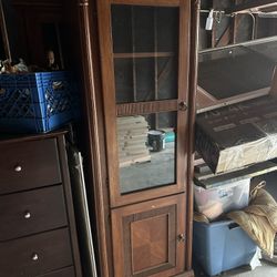 Tall display cabinet or curio cabinet