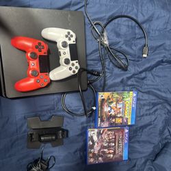 PS4 With 2 Controllers And 2 Games 