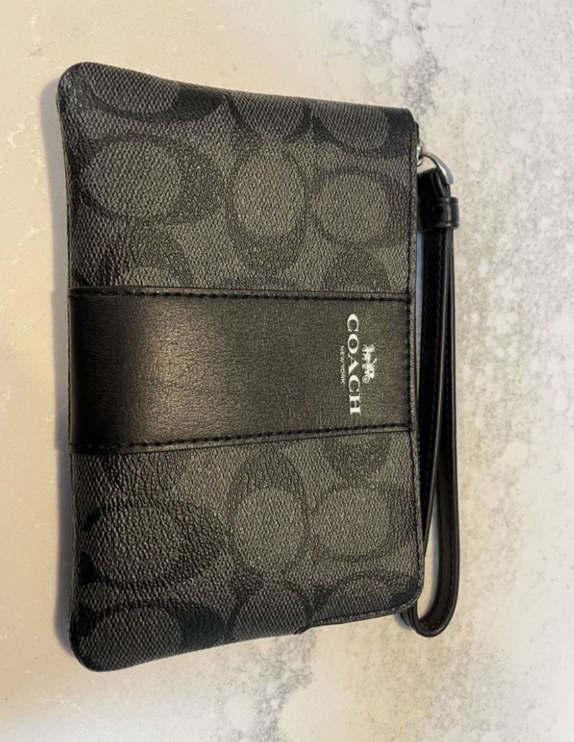 Black leather Coach Wristlet