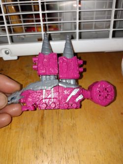 Ankyloze figure from the Kishiryu Sentai Ryusoulger series or the Ankylo Hammer Zord from Power Rangers Dino Fury.