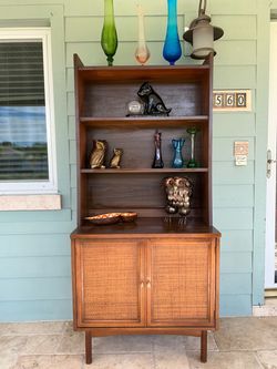 Vintage Mid Century Modern wooden Bookshelf Cabinet W/Cane Doors.