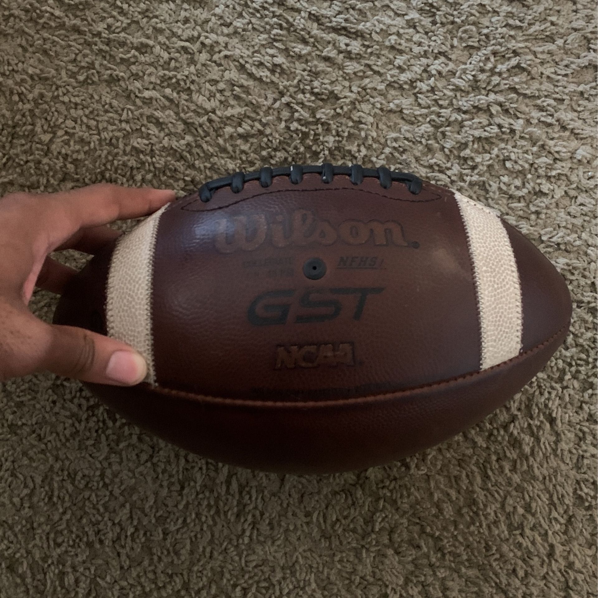 Official NCAA Wilson GST Leather Football (broken In)