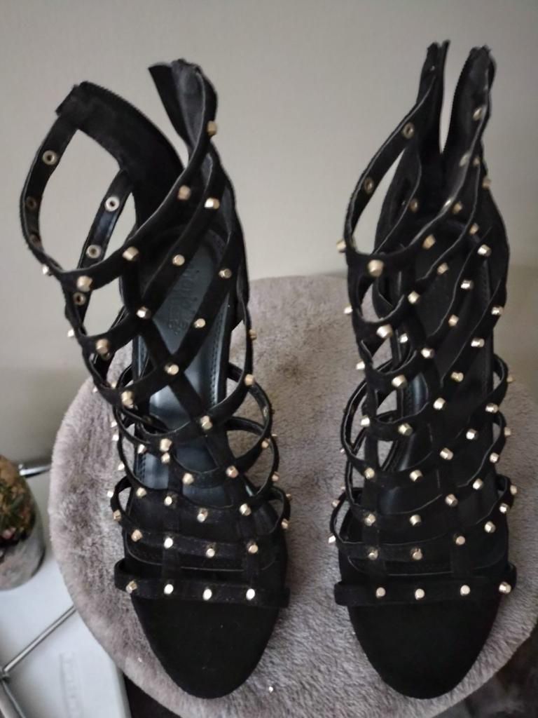 Black heels with gold studs