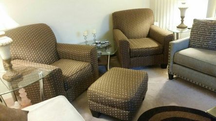 Two beautiful sofa chairs with matching ottoman