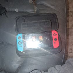 Nintendo Switch+ Case+ Two Games - Zelda And Mario kart 8