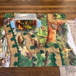 Dinasor Playmat With A Box Of Dino Toys