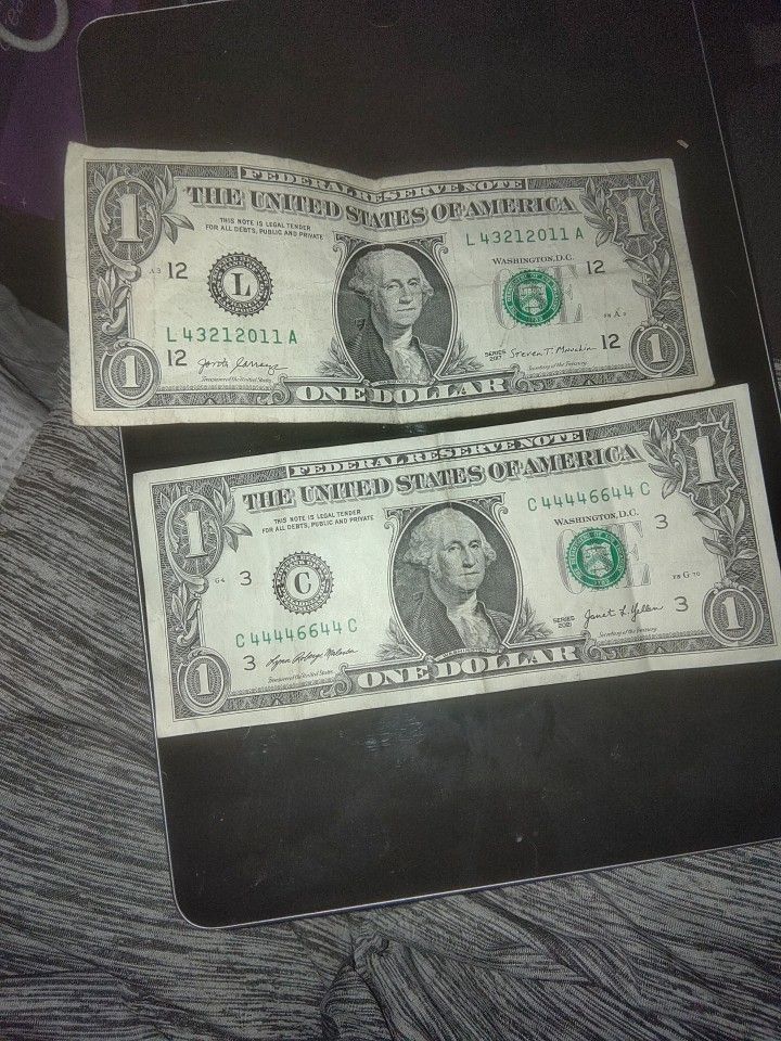 Five $1 Bills With Fancy Serial Numbers On Them