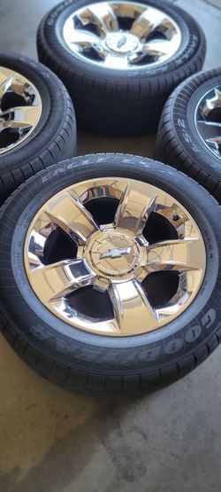 POLISHED CHEVY OEM RIMS & TIRES