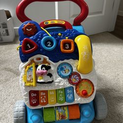 V Tech Sit To Stand Baby Walker 