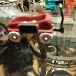 Vintage Radio Flyer Magnet With Ball ,Bat, And Racket In Back 