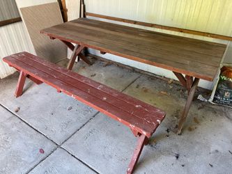 Long wooden pick nick table with one bench