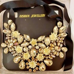 Brand new statement necklace with the original box.
Great gift.