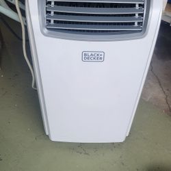 12,000 BTU Air Conditioner,  Like New. Used Maybe 4 Times.