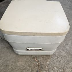 Porta potty for camping.