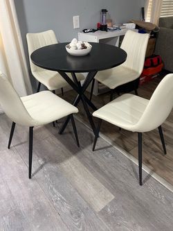 BEAUTIFUL SMALL BLACK TABLE AND 4 CHAIRS, IN EXCELLENT CONDITION