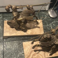Brass Statues On Granite Base