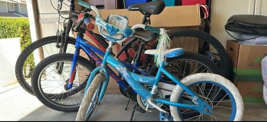 One adult man’s bike and two children’s bike