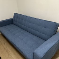 Blue futon from Living Spaces 