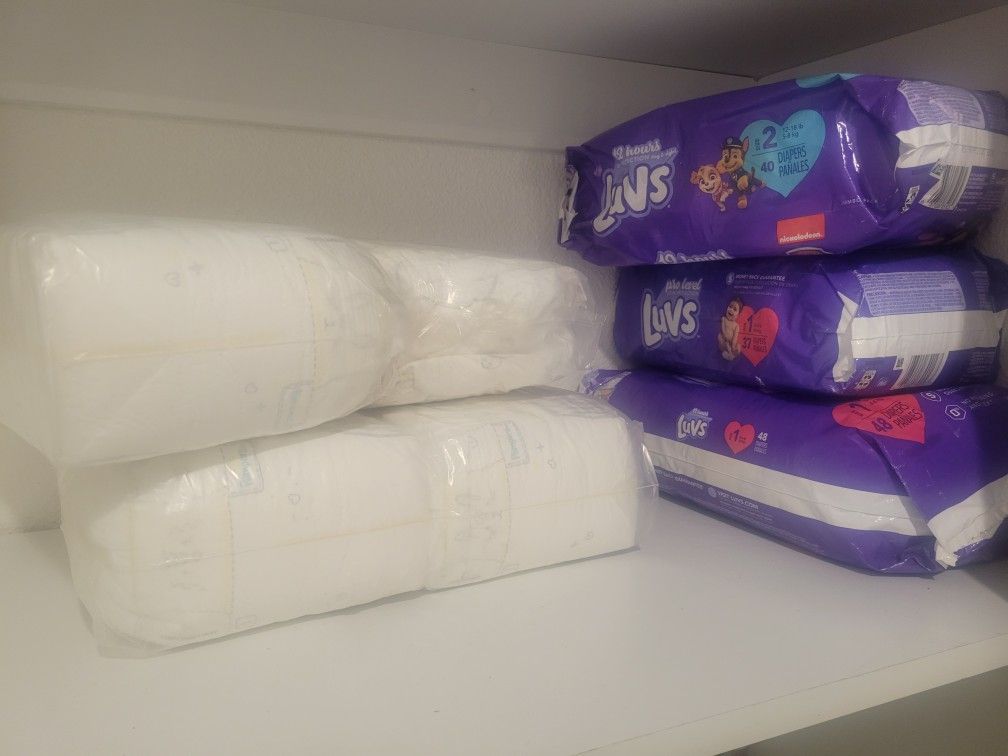 Newborn Pampers & Clothes