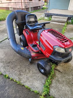 Riding lawn mower with bagger