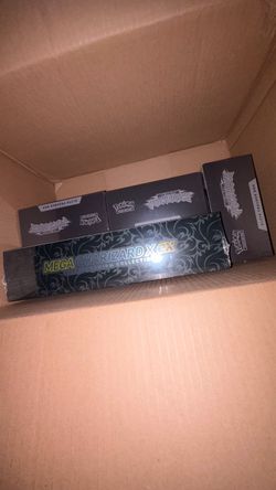 Sealed Mega Charizard UPC and 3 Pitch Black ETB