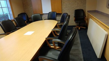 12 ft conference table and chairs.