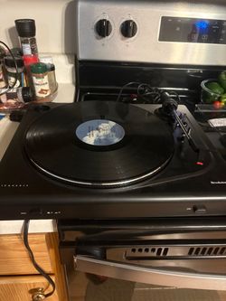 Brookstone iConvert Turntable Record Player