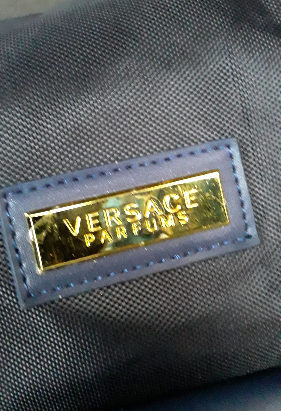 Versace and Coach bags