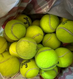 35 used tennis balls