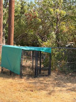 Outdoor dog kennel, 54 inches wide 44 inches tall