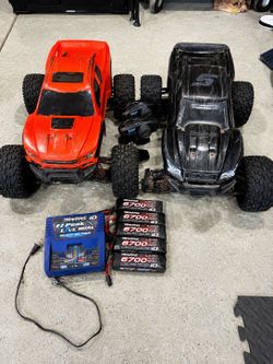 2 X-Maxx 8S RC Trucks + 4 Traxxas Batteries & Dual Charger