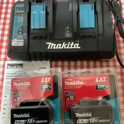 Makita. 18V LXT Lithium Ion Double Rapid Charger and (2) 6.0Ah Batteries.
