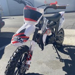 **Brand New Dirt Bike for Kids and Adults** -50cc engine. -Automatic. -2 stroke engine. -Speed governor. -Support up 200 pounds. -Mph 35. **High perfo