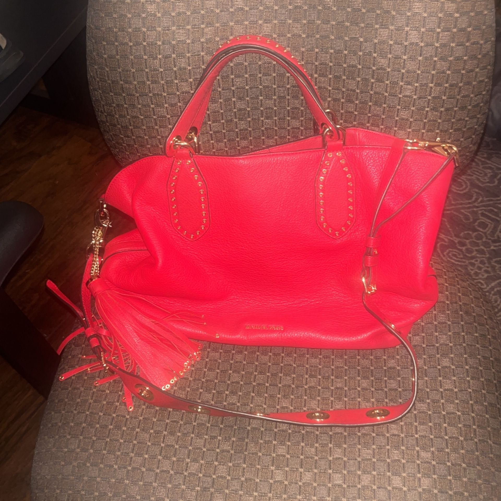 michael Kord red purse
