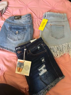 Woman shorts all medium size and new  8$ each