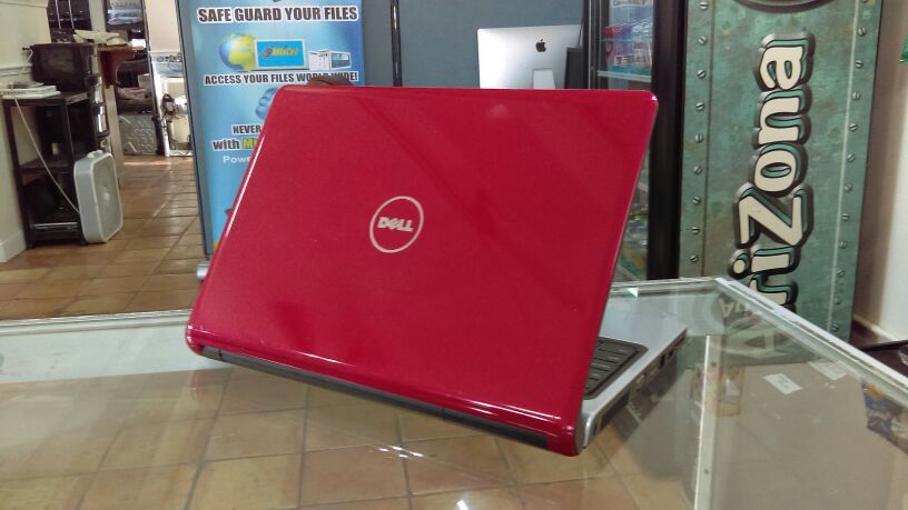14.1" Red Dell Inspiron 1470 Laptop. Win 7. 320 GB HDD. 4 GB RAM. Intel core 2 duo. HDMI. DVD Burner. SD Card reader.