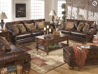 New Ashley Leather Sofa Includes Pillows