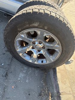 Two rims and tires for 2017 dodge ram 1500 wheels