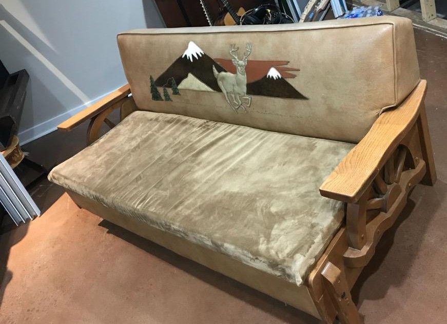 Vintage wagon wheel hide a bed couch