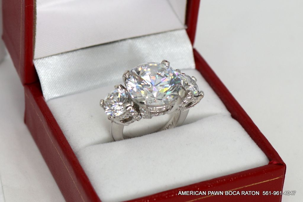 Solid Platinum 3 large stone ring (cubic zirconia) ring Size 4 Excellent vintage condition .