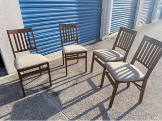4 folding chairs with cushion $60 obo