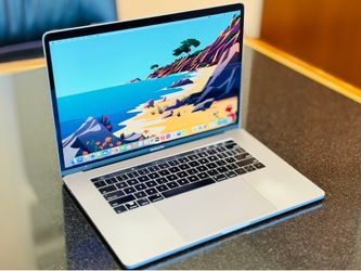 Two Apple MacBook Pro 15 inch Intel chip 2017 and 2018