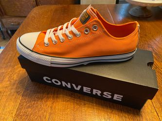 Converse men’s size 10 1/2 brand new in box color orange