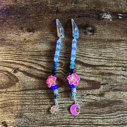 Silver Hair Clips With 3D Plumeria Beads And Sun And Moon Charms